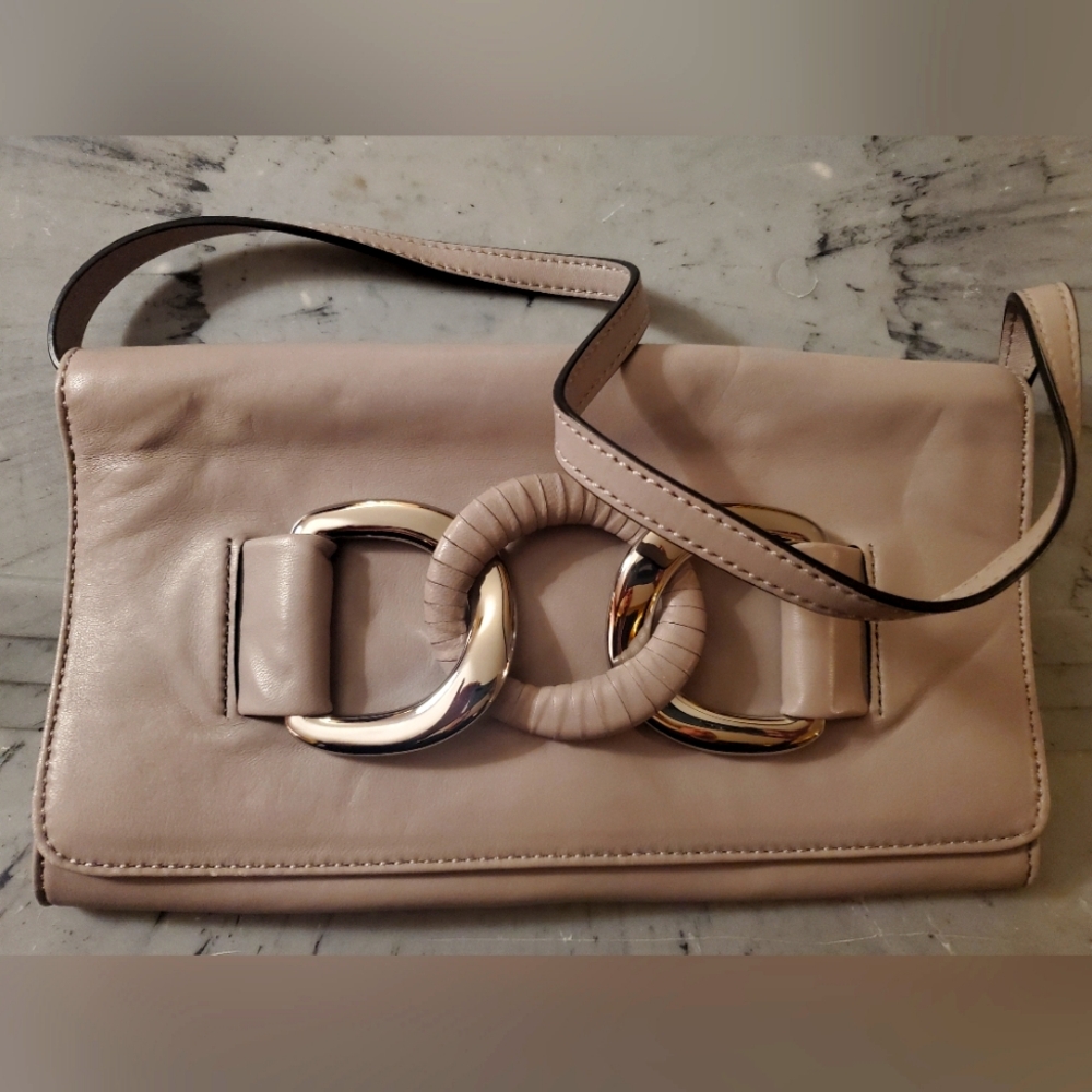 Tan/gray Michael Kors clutch with strap